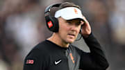 Sep 13, 2025; West Lafayette, Indiana, USA; Southern California Trojans head coach Lincoln Riley stands on the sidelines during the first quarter against the Purdue Boilermakers at Ross-Ade Stadium. Mandatory Credit: Marc Lebryk-Imagn Images