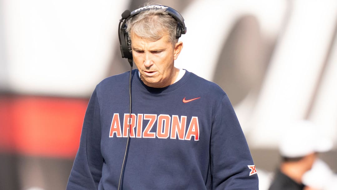 Arizona Wildcats head coach Brent Brennan walks the sideline in the fourth quarter of the NCAA football game between the Cincinnati Bearcats and Arizona Wildcats at Nippert Stadium in Cincinnati on Nov. 15, 2025.