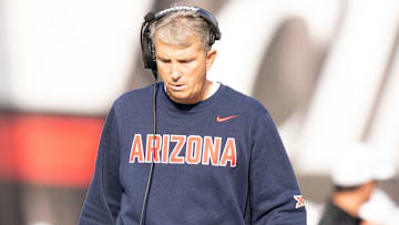 Arizona Wildcats head coach Brent Brennan walks the sideline in the fourth quarter of the NCAA football game between the Cincinnati Bearcats and Arizona Wildcats at Nippert Stadium in Cincinnati on Nov. 15, 2025.