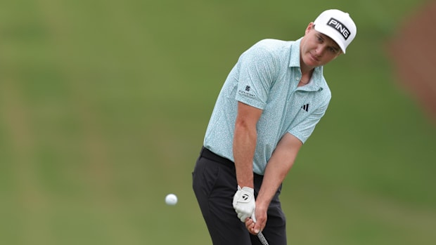 Matt McCarty chips onto the 18th green during the third round of the Wyndham Championship.
