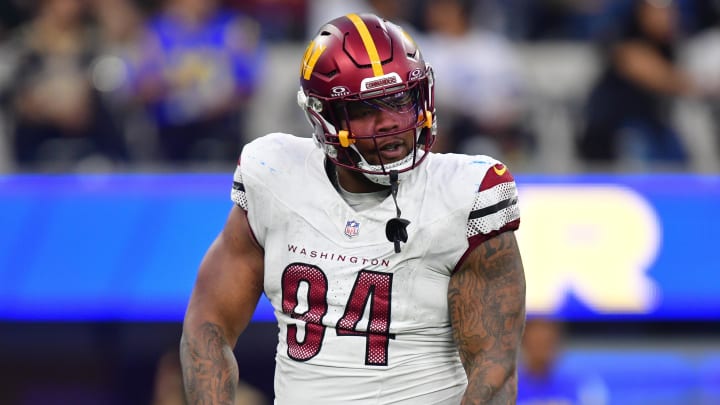 Dec 17, 2023; Inglewood, California, USA; Washington Commanders defensive tackle Daron Payne (94) reacts after sacking Los Angeles Rams quarterback Matthew Stafford (9) during the second half at SoFi Stadium. Mandatory Credit: Gary A. Vasquez-USA TODAY Sports