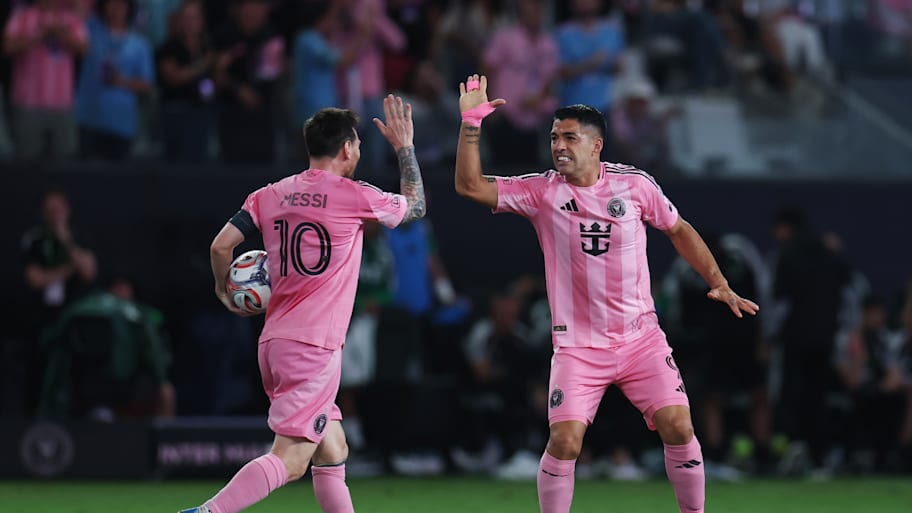 Lionel Messi (left) and Luis Suárez (right)