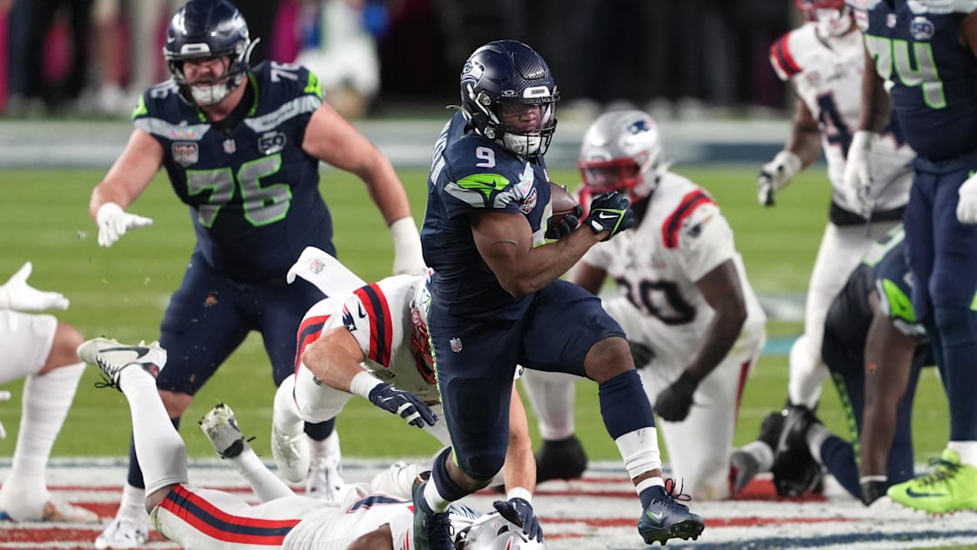 Feb 8, 2026; Santa Clara, CA, USA; Seattle Seahawks running back Kenneth Walker III (9) carries the ball against the New England Patriots during the fourth quarter in Super Bowl LX at Levi's Stadium. Mandatory Credit: Darren Yamashita-Imagn Images