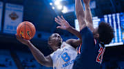 Nov 11, 2025; Chapel Hill, North Carolina, USA; North Carolina Tar Heels forward Caleb Wilson (8) shoots against Radford Highlanders forward Tyson Brown (21) during the second half at Dean E. Smith Center. 