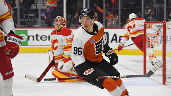 Mar 4, 2025; Philadelphia, Pennsylvania, USA; Philadelphia Flyers left wing Andrei Kuzmenko (96) celebrates his goal against Calgary Flames goaltender Dustin Wolf (32) during the first period at Wells Fargo Center.