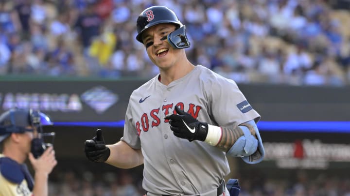 Jul 20, 2024; Los Angeles, California, USA;  Boston Red Sox left fielder Tyler O'Neill (17) celebrates after hitting a two-run home run in the seventh inning against the Los Angeles Dodgers at Dodger Stadium.