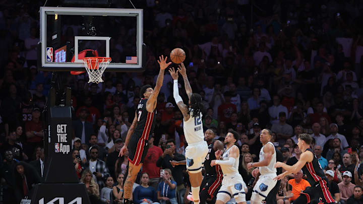 Memphis Grizzlies guard Ja Morant shoots and scores the game-winning shot over Miami Heat center Kel'el Ware during the fourth quarter. Memphis Grizzlies guard Ja Morant shoots and scores the game-winning shot over Miami Heat center Kel'el Ware during the fourth quarter.