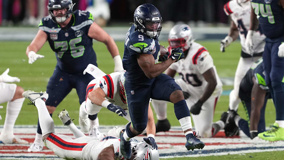 Seattle Seahawks running back Kenneth Walker III (9) carries the ball against the New England Patriots.