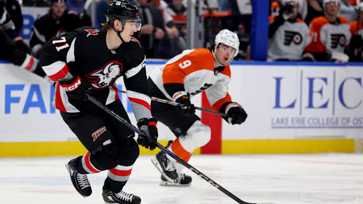 Apr 17, 2025; Buffalo, New York, USA;  Buffalo Sabres center Ryan McLeod (71) skates up ice with the puck during the first period against the Philadelphia Flyers at KeyBank Center. Mandatory Credit: Timothy T. Ludwig-Imagn Images