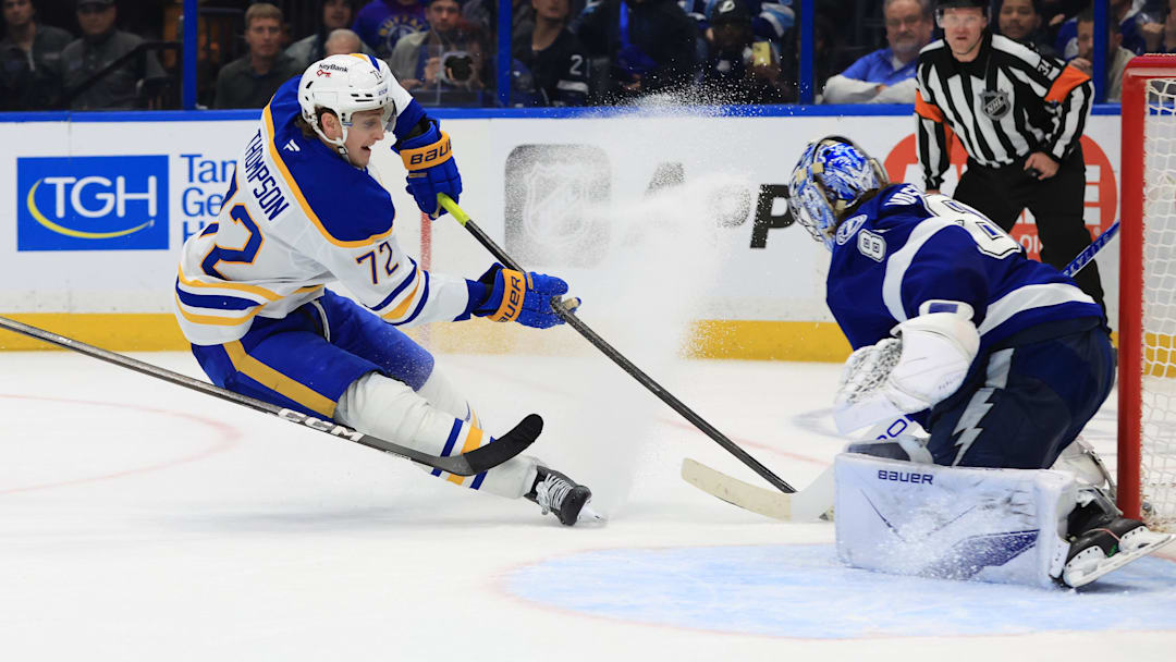 Feb 3, 2026; Tampa, Florida, USA; Buffalo Sabres center Tage Thompson (72) shoots as Tampa Bay Lightning goaltender Andrei Vasilevskiy (88) makes a save during the overtime period at Benchmark International Arena. Mandatory Credit: Kim Klement Neitzel-Imagn Images