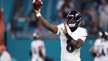 Oct 30, 2025; Miami Gardens, Florida, USA; Baltimore Ravens quarterback Lamar Jackson (8) warms up before a game against the Miami Dolphins at Hard Rock Stadium. Mandatory Credit: Nathan Ray Seebeck-Imagn Images