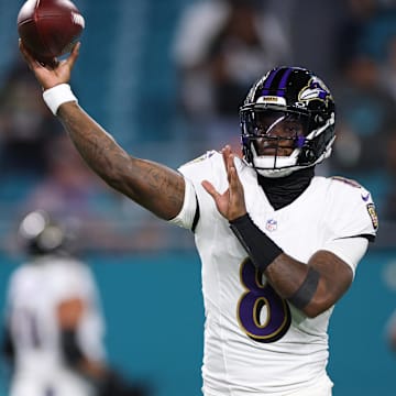 Oct 30, 2025; Miami Gardens, Florida, USA; Baltimore Ravens quarterback Lamar Jackson (8) warms up before a game against the Miami Dolphins at Hard Rock Stadium. Mandatory Credit: Nathan Ray Seebeck-Imagn Images