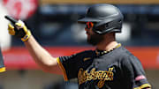 Apr 17, 2025; Pittsburgh, Pennsylvania, USA;  Pittsburgh Pirates shortstop Isiah Kiner-Falefa (7) reacts at first base with a single against the Washington Nationals during the fifth inning at PNC Park.