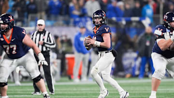 Dec 6, 2025; Charlotte, NC, USA; Virginia Cavaliers quarterback Chandler Morris (4) looks to pass in the second half against the Duke Blue Devils during the 2025 ACC Championship game at Bank of America Stadium. Mandatory Credit: Jim Dedmon-Imagn Images