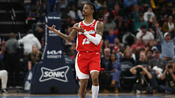 Apr 1, 2025; Memphis, Tennessee, USA; Memphis Grizzlies guard Ja Morant (12) reacts after a basket during the second quarter against the Golden State Warriors at FedExForum. Mandatory Credit: Petre Thomas-Imagn Images
