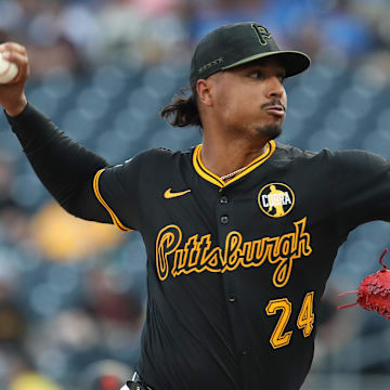 Aug 4, 2025; Pittsburgh, Pennsylvania, USA;  Pittsburgh Pirates starting pitcher Johan Oviedo (24) delivers a pitch against the San Francisco Giants during the first inning at PNC Park. Mandatory Credit: Charles LeClaire-Imagn Images