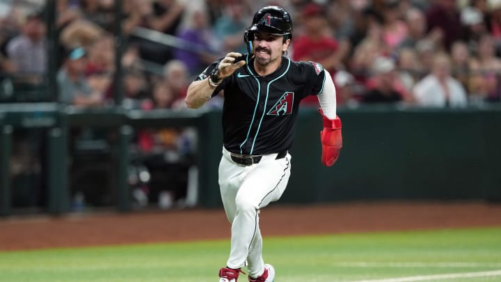 Jun 15, 2024; Phoenix, Arizona, USA; Arizona Diamondbacks outfielder Corbin Carroll (7) rounds third base and scores a run against the Chicago White Sox during the first inning at Chase Field. Mandatory Credit: Joe Camporeale-USA TODAY Sports