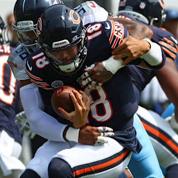 Sep 8, 2024; Chicago, Illinois, USA; Tennessee Titans linebacker Harold Landry III (58) sacks Chicago Bears quarterback Caleb Williams (18) during the second quarter at Soldier Field. Mandatory Credit: Mike Dinovo-Imagn Images