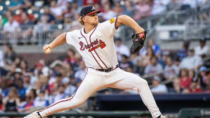 Aug 22, 2024; Cumberland, Georgia, USA; Atlanta Braves pitcher Spencer Schwellenbach (56) pitches the ball against Atlanta Braves during the third inning at Truist Park.