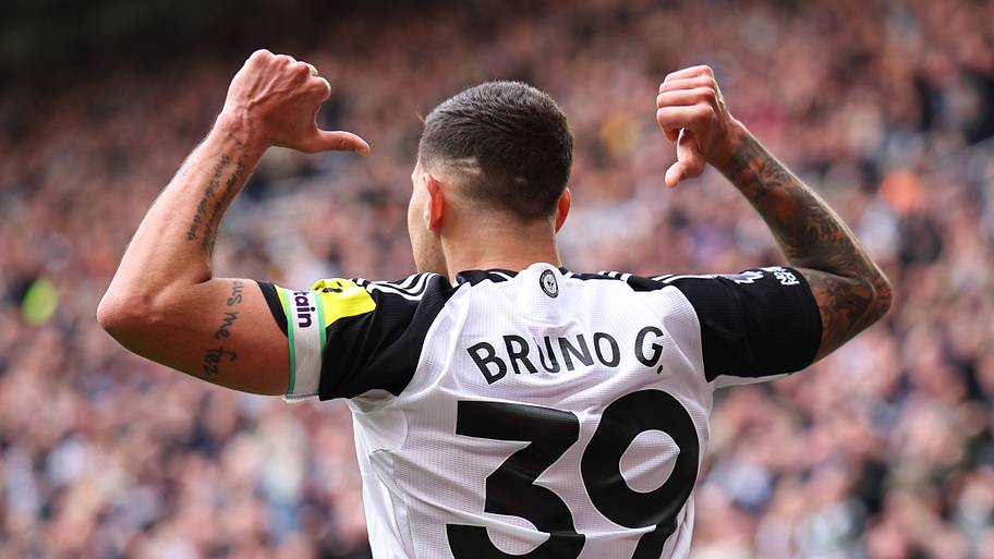 Bruno Guimarães celebrating.