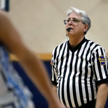 Bob Fuhrman officiates a junior varsity basketball game between Highlands and Burrell Jan. 17 at Burrell High School. One of the 12 rules changes adopted by that National Federation of High Schools was an increased emphasis on flopping. Everyone is still adjusting to the rule change.
