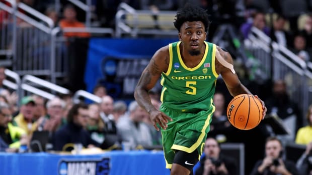 Oregon Ducks guard Jermaine Couisnard (5) brings the ball up court during the first half of the game against the South Caroli