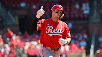 Sep 17, 2025; St. Louis, Missouri, USA; Cincinnati Reds first baseman Spencer Steer (7) signals to the Cincinnati Reds dugout as he rounds the bases after hitting a three-run home run in the fourth inning against the St. Louis Cardinals at Busch Stadium. Mandatory Credit: Tim Vizer-Imagn Images