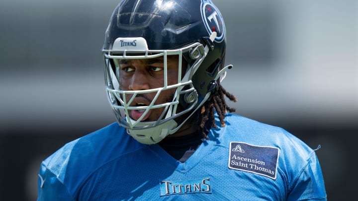 Tackle JC Latham (55) runs through drills during Tennessee Titans practice at Ascension Saint Thomas Sports Park in Nashville, Tenn., Wednesday, May 29, 2024.