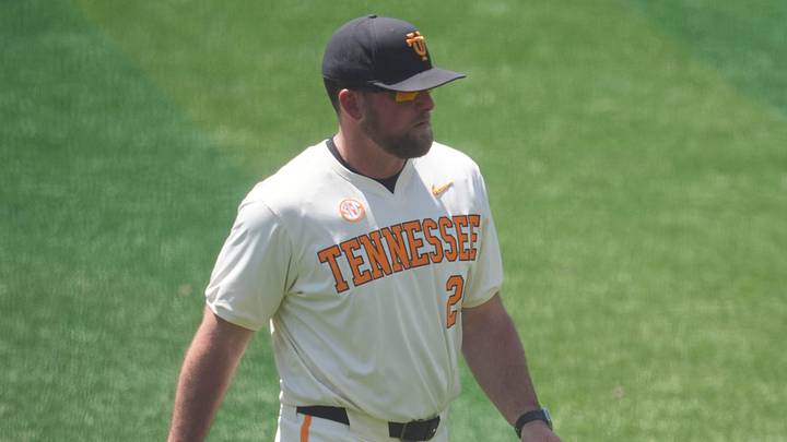 Tennessee baseball coach Josh Elander returns to the dugout after taking out pitcher Taylor Tracey (29) in an NCAA college baseball game against and Texas on May 10, 2026, in Knoxville, Tennessee.