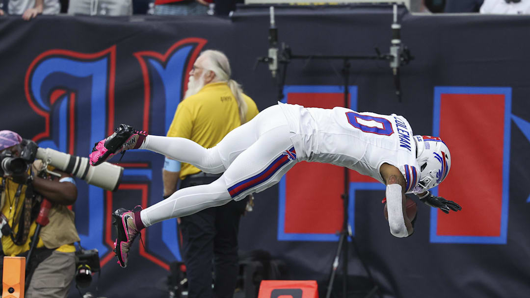 Oct 6, 2024; Houston, Texas, USA; Buffalo Bills wide receiver Keon Coleman (0) leaps into the end zone for a touchdown.