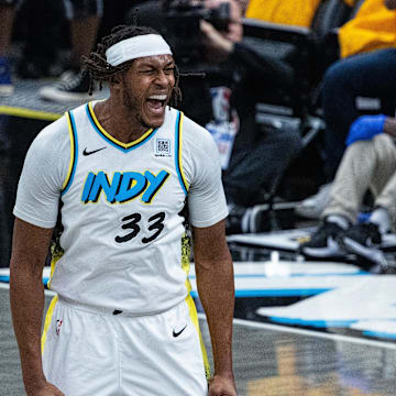 May 9, 2025; Indianapolis, Indiana, USA; Indiana Pacers center Myles Turner (33) celebrates a made basket during game three of the second round for the 2025 NBA Playoffs against the Cleveland Cavaliers at Gainbridge Fieldhouse. Mandatory Credit: Trevor Ruszkowski-Imagn Images
