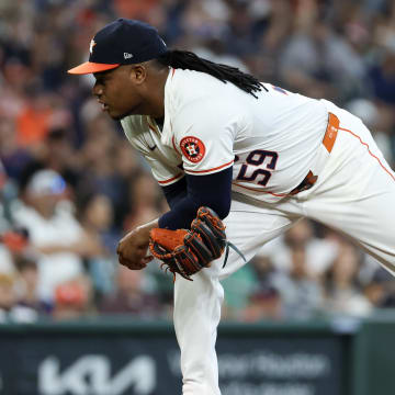 Jun 23, 2024; Houston, Texas, USA;  Houston Astros starting pitcher Framber Valdez (59) looks before pitches against the Baltimore Orioles in the first inning at Minute Maid Park. Mandatory Credit: Thomas Shea-USA TODAY Sports