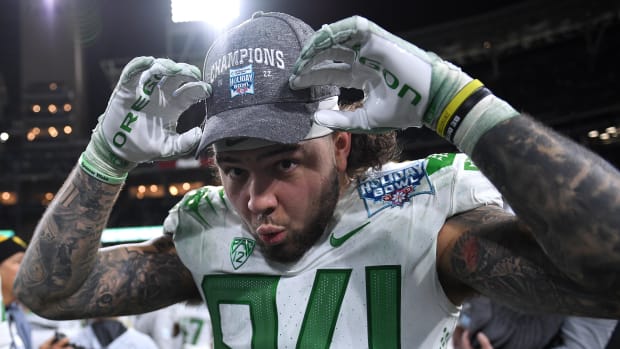 Dec 28, 2022; San Diego, CA, USA; Oregon Ducks tight end Cam McCormick (84) poses for a photograph after defeating the North 