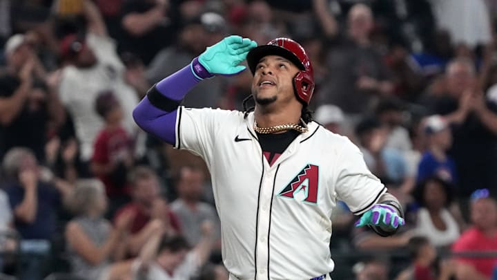 Sep 11, 2024; Phoenix, Arizona, USA; Arizona Diamondbacks second base Ketel Marte (4) reacts after hitting a three-run home run against the Texas Rangers in the fourth inning at Chase Field. Mandatory Credit: Rick Scuteri-Imagn Images