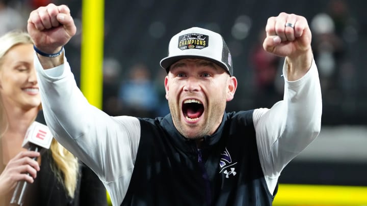 Dec 23, 2023; Las Vagas, NV, USA; Northwestern Wildcats head coach David Braun celebrates after the Wildcats defated the Utah Utes 14-7 to win the Las Vegas Bowl at Allegiant Stadium. Mandatory Credit: Stephen R. Sylvanie-USA TODAY Sports