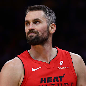 Nov 18, 2024; Miami, Florida, USA; Miami Heat forward Kevin Love (42) looks on against the Philadelphia 76ers during the third quarter at Kaseya Center. Mandatory Credit: Sam Navarro-Imagn Images