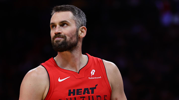 Miami Heat forward Kevin Love looks on against the Philadelphia 76ers. Miami Heat forward Kevin Love looks on against the Philadelphia 76ers.
