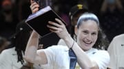 Aug 12, 2021; Phoenix, Arizona, USA; Seattle Storm guard Sue Bird (10) holds up the trophy after defeating the Connecticut Sun during the Inaugural WNBA Commissioners Cup Championship Game at Footprint Center. 