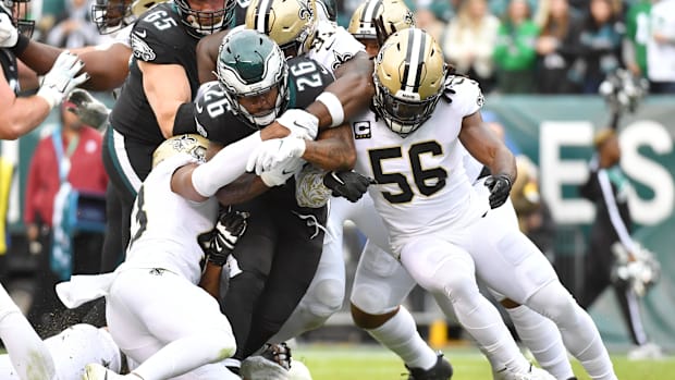 New Orleans Saints linebacker Demario Davis (56) stuffs a running play against the Philadelphia Eagles  