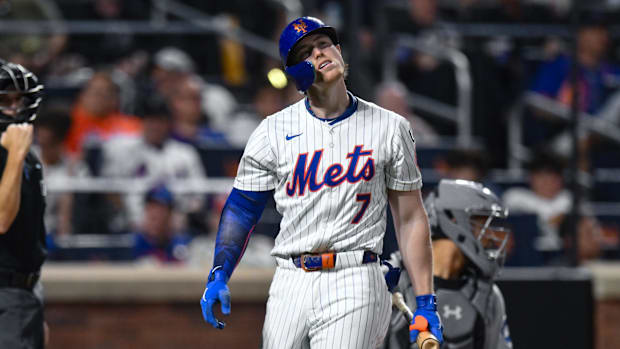 New York Mets third baseman Brett Baty (7) reacts after striking out on August 28, 2025