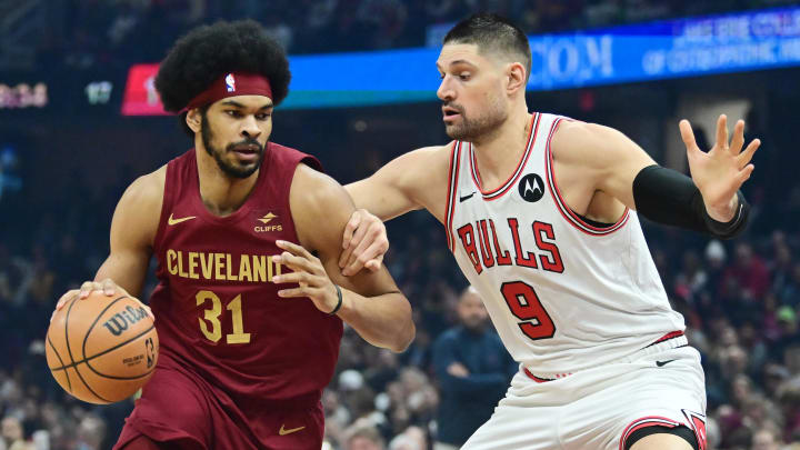 Feb 14, 2024; Cleveland, Ohio, USA; Cleveland Cavaliers center Jarrett Allen (31) drives to the basket against Chicago Bulls center Nikola Vucevic (9) during the first half at Rocket Mortgage FieldHouse. Mandatory Credit: Ken Blaze-USA TODAY Sports