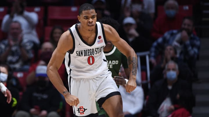 Jan 8, 2022; San Diego, California, USA; San Diego State Aztecs forward Keshad Johnson (0) reacts