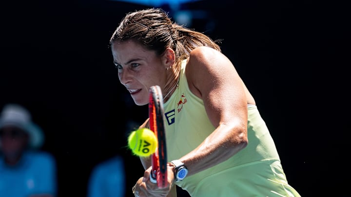American tennis player Emma Navarro returns a shot at the Australian Open. American tennis player Emma Navarro returns a shot at the Australian Open.
