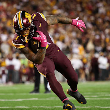 Oct 17, 2025; Minneapolis, Minnesota, USA; Minnesota Golden Gophers running back Darius Taylor (1) runs for a touchdown against the Nebraska Cornhuskers during the second half at Huntington Bank Stadium. Mandatory Credit: Matt Krohn-Imagn Images
