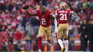 Dec 10, 2023; Santa Clara, California, USA; San Francisco 49ers cornerback Deommodore Lenoir (2) holds onto the ball after breaking up a pass attempt against the Seattle Seahawks in the fourth quarter at Levi's Stadium. 