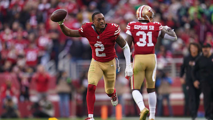 Dec 10, 2023; Santa Clara, California, USA; San Francisco 49ers cornerback Deommodore Lenoir (2) holds onto the ball after breaking up a pass attempt against the Seattle Seahawks in the fourth quarter at Levi's Stadium. 