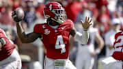 Oct 12, 2024; Tuscaloosa, Alabama, USA;  Alabama Crimson Tide quarterback Jalen Milroe (4) throws a pass against the South Carolina Gamecocks during the first half at Bryant-Denny Stadium. Mandatory Credit: Butch Dill-Imagn Images