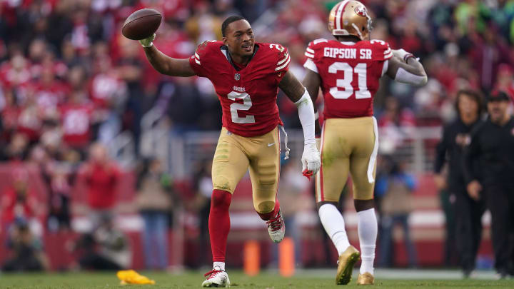 Dec 10, 2023; Santa Clara, California, USA; San Francisco 49ers cornerback Deommodore Lenoir (2) holds onto the ball after breaking up a pass attempt against the Seattle Seahawks in the fourth quarter at Levi's Stadium. Mandatory Credit: Cary Edmondson-USA TODAY Sports