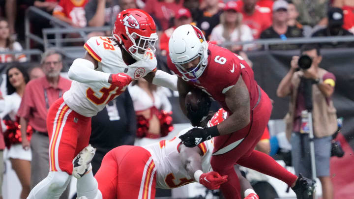 Sep 11, 2022; Glendale, Arizona, United States;  Arizona Cardinals running back James Conner (6) is tackled by Kansas City Chiefs linebacker Nick Bolton (32) and cornerback L'Jarius Sneed (38) during the second quarter at State Farm Stadium.

Nfl Cardinals Nfl Game Kansas City Chiefs At Arizona Cardinals