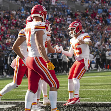 Nov 24, 2024; Charlotte, North Carolina, USA; Kansas City Chiefs tight end Noah Gray (83) celebrates his touchdown with quarterback Patrick Mahomes (15) and tight end Travis Kelce (87) during the second quarter at Bank of America Stadium. Mandatory Credit: Jim Dedmon-Imagn Images
